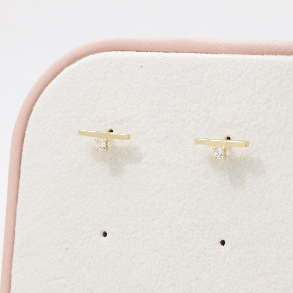 small earrings gold color with zircons lady