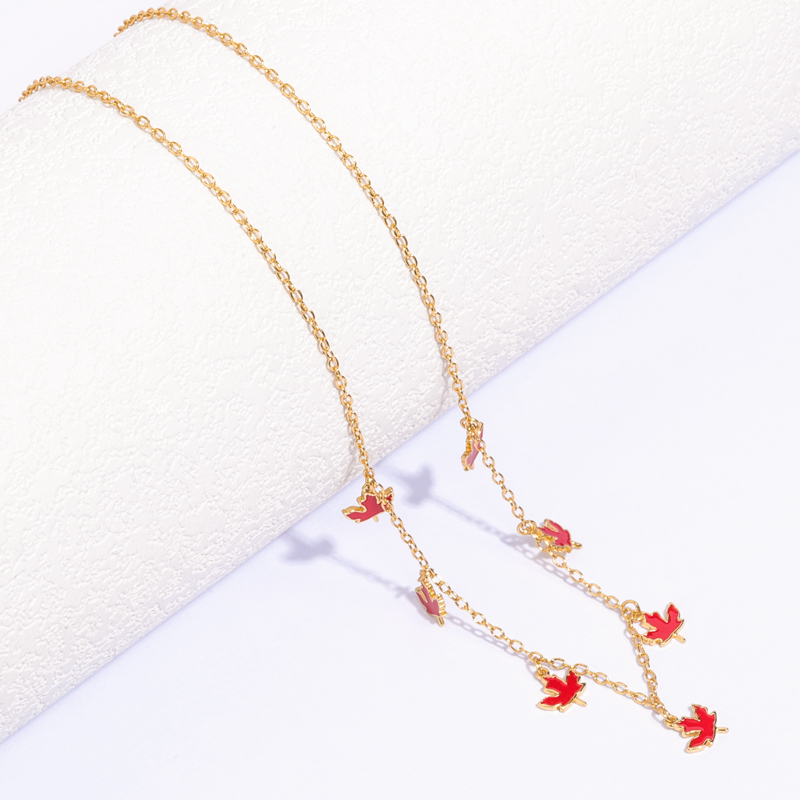 gold plated necklace with lots of charms